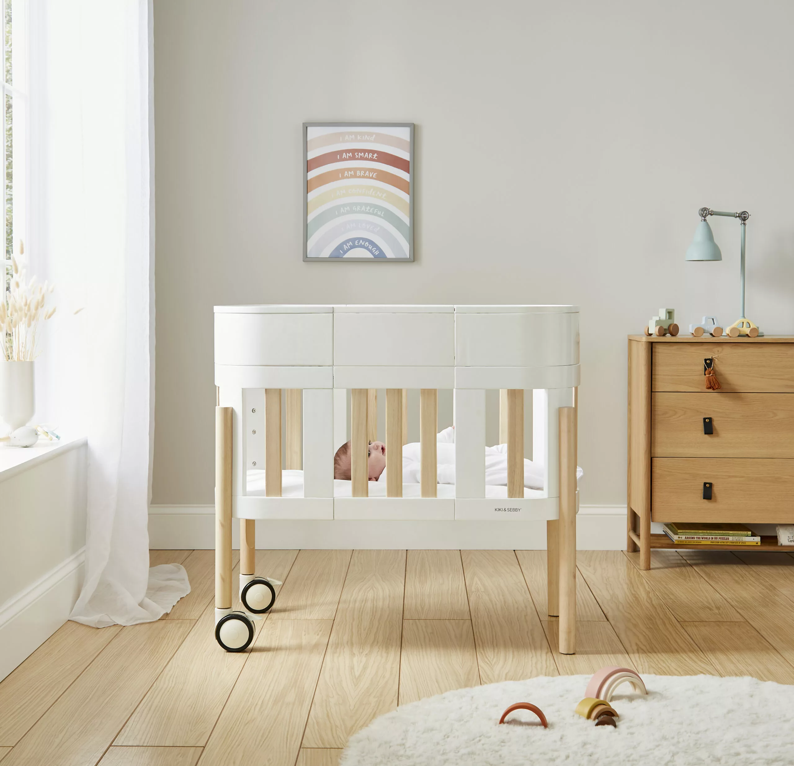 Mini crib with drawers online